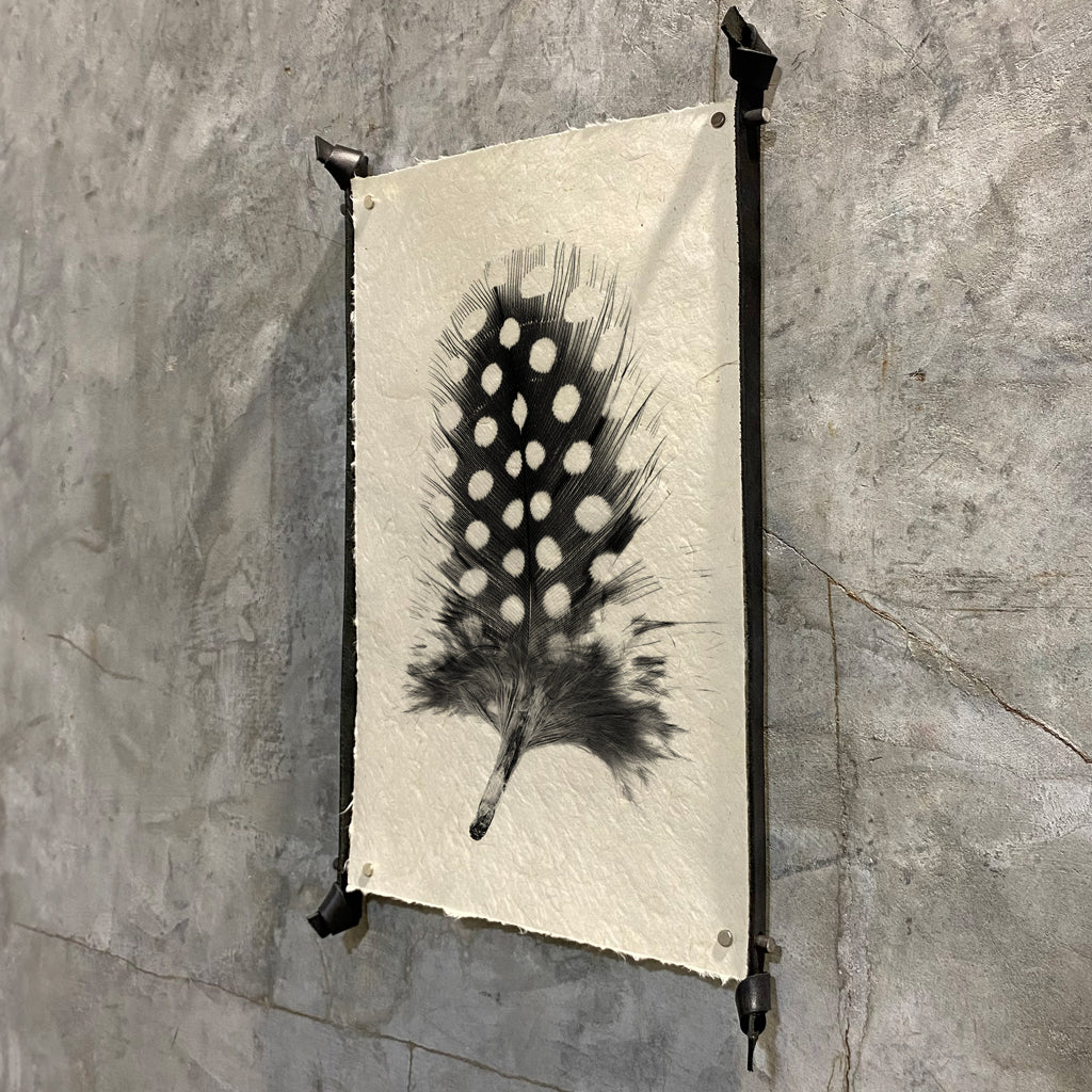 Frameless leather and steel hangers